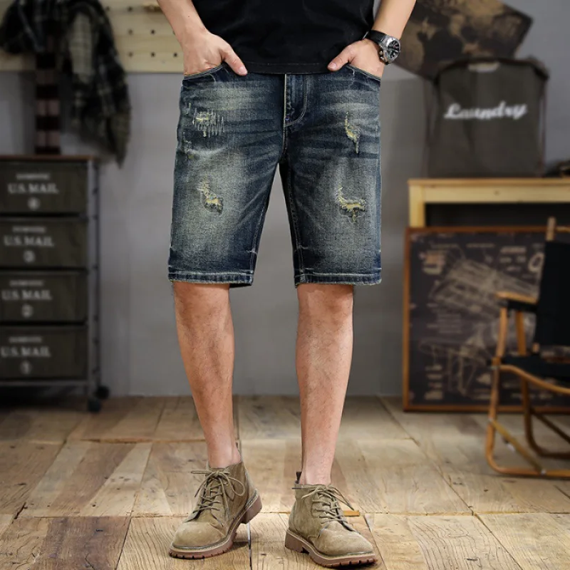 Celana pendek DENIM ขูดลายย้อนยุคซักได้สำหรับฤดูร้อนของผู้ชายคร็อปแพนท์แฟชั่น2024ใหม่