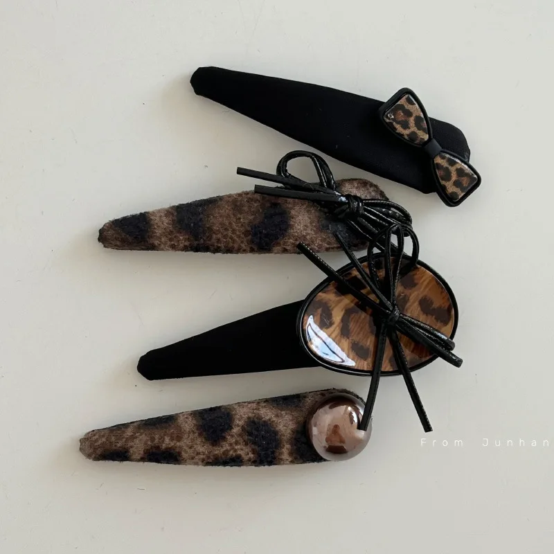 Design sense leopard print high sense hairpin retro fashion pearl metal bow temperament bangs clip hairpin hair accessories