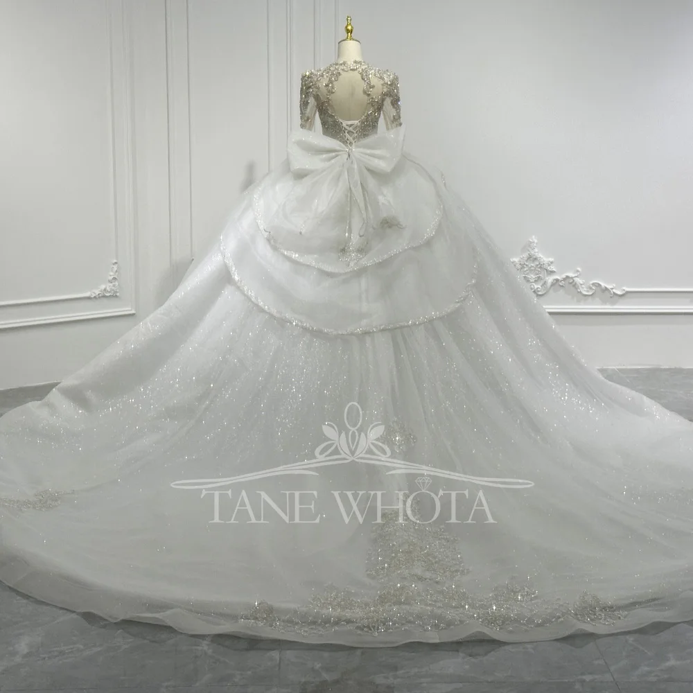 긴 소매 크리스탈 스팽글 리본 키홀 백 레이스업 맞춤형 볼 가운이 있는 고급스러운 O넥 웨딩 드레스 여성용