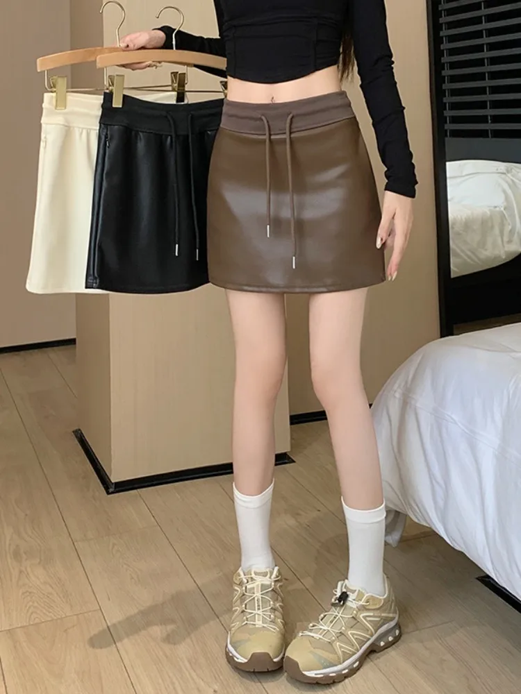 Fashion PU Leather Skirt Vintage Y2k Spice Girl High Waist Drawstring A-Line Culotte Sexy Wrap Hip Anti Slip Short Skirts Women