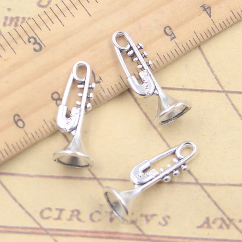 10 sztuk Charms muzyka saksofon trąbka 24x10mm tybetański srebrny kolor wisiorki antyczne tworzenie biżuterii DIY Handmade Craft