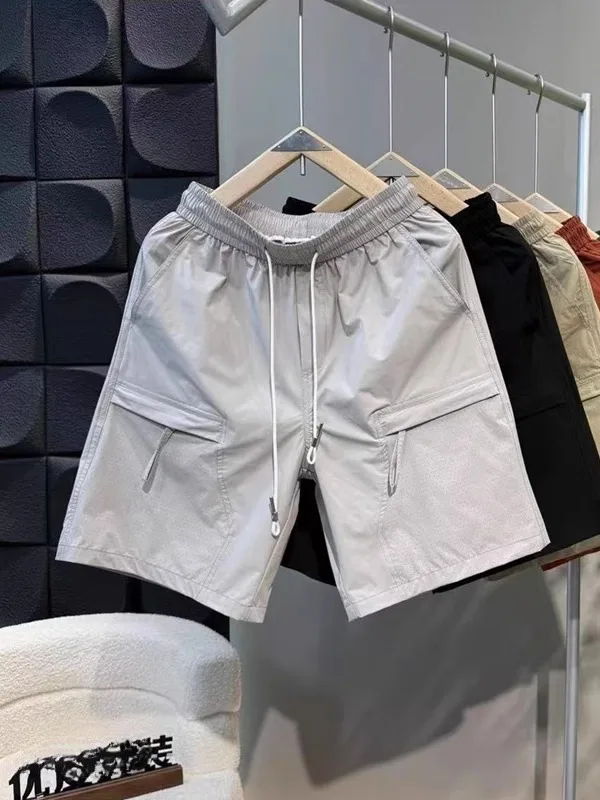 

Summer New Men's American Workwear orts High Quali Loose Punching Breathable Qui Dry Casual Five-Quarter Pants