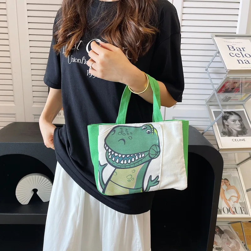 

19Cm Disney Rex Hamm Cartoon Printed Canvas Handbag Double-Layer Item Storage Go Out Picnic Bag Student friend Birthday Gifts