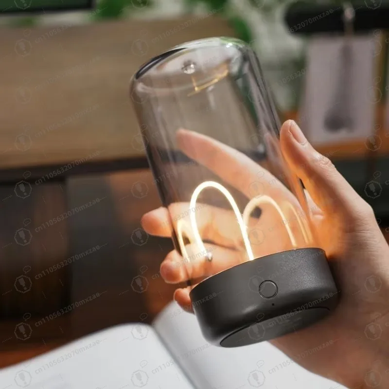 

A must for hipsters! Fila simple hourglass light, magnetic LED dining table night light + camping light