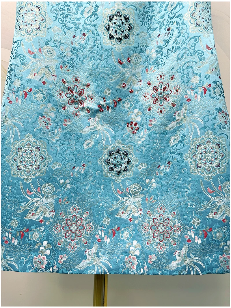 2026 Primavera francese elegante temperamento socialite girocollo senza maniche ricamo in rilievo vita alta abito corto a trapezio per le donne