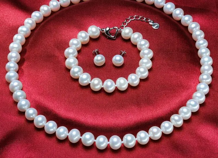 

sets of 10-11mm south sea round white pearl necklac&earring bracelet 925s