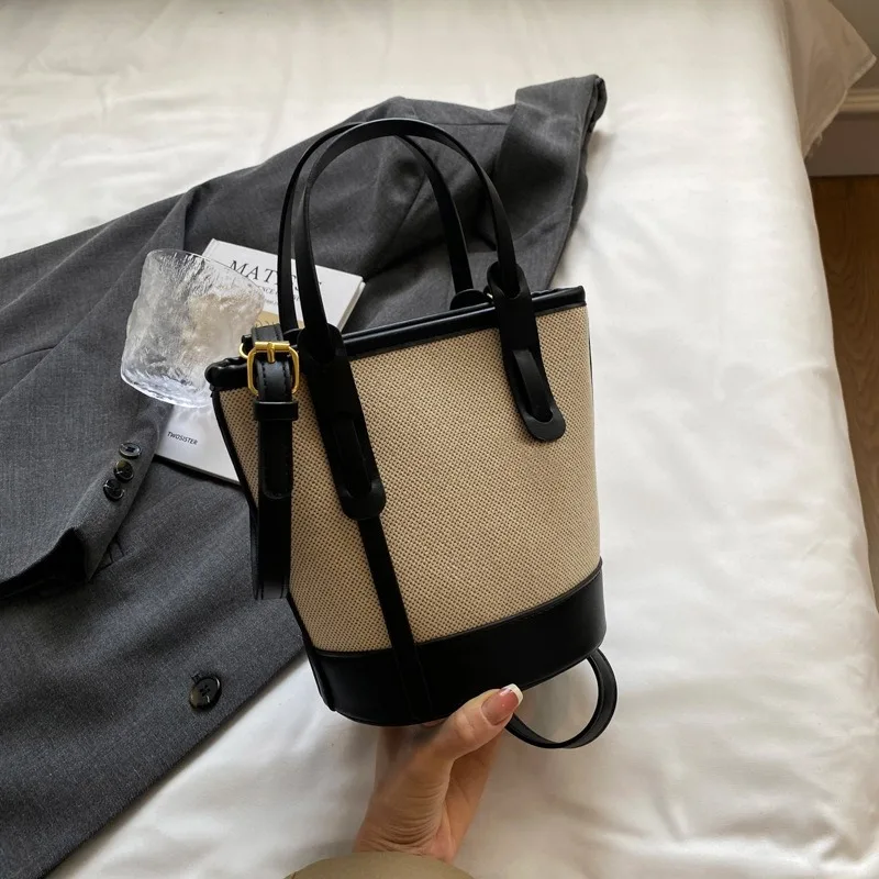 2026 explosions contrast color bucket bag female Joker shoulder slung commuter bag urban minimalist advanced wind bag