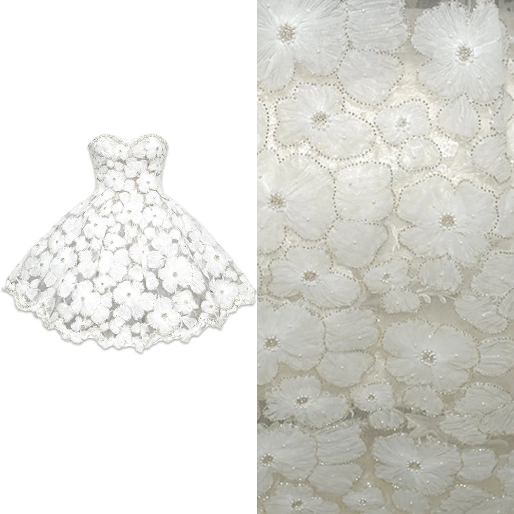 The new irregular three-dimensional floral beaded and sequined lace fabric is suitable for wedding parties