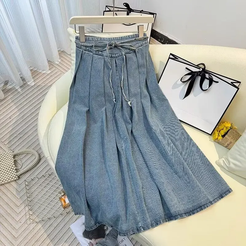Gonna di jeans con lacci retrò per le donne Autunno a vita alta Gonna a pieghe di media lunghezza Temperamento Gonna a ombrello a trapezio con orlo largo