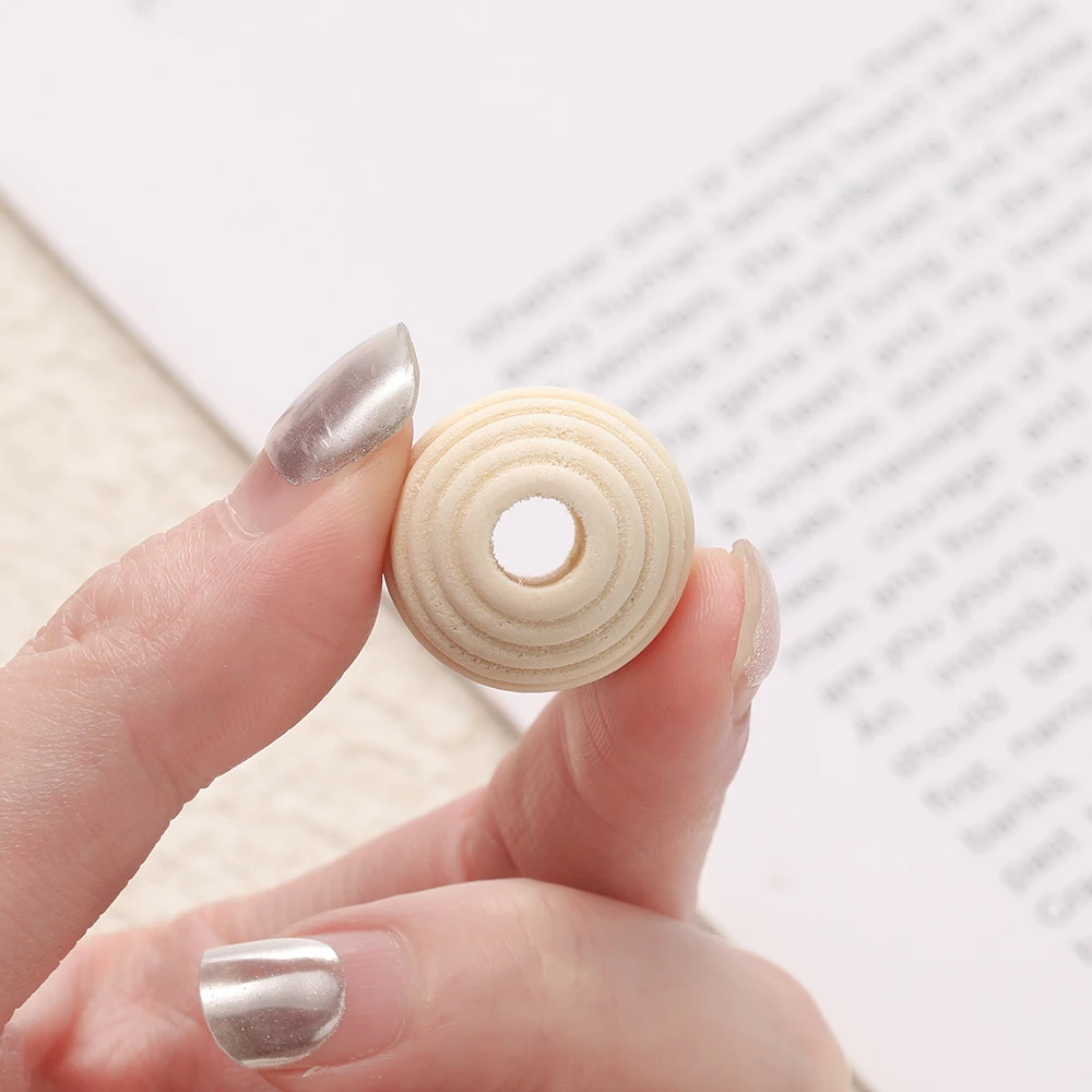 Рисунок 6 - деревянные бусины с натуральной резьбой