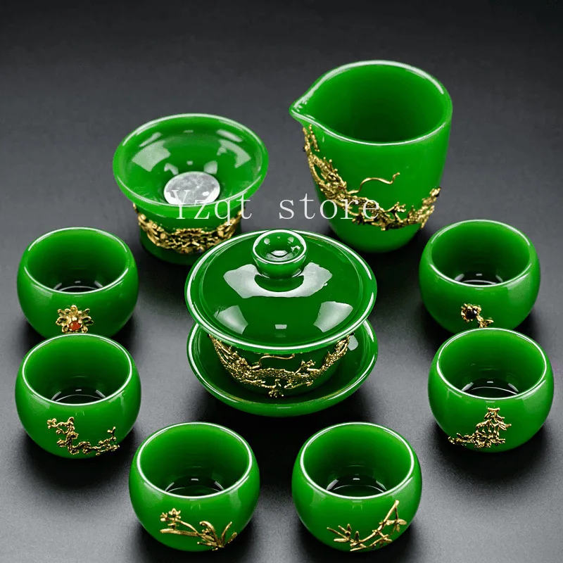 

Специальный набор, чайный сервиз, подарки, глазурованные бытовые золотые инкрустированные нефритовым фарфоровым кунг-фу, чайный сервиз Xinju для гостиной, высококачественная крышка, чаша для чая