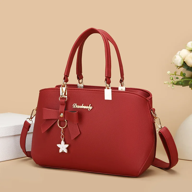 Wear-resistant PU leather hand-held women's bag, large-capacity commuter hand-held shoulder crossbody bag