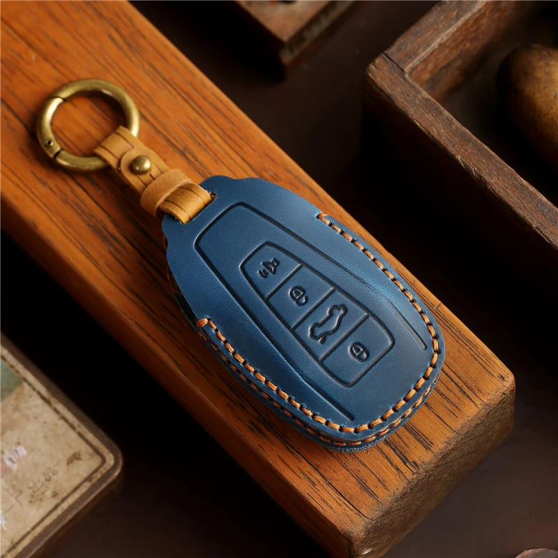 

High Quality Leather Car Remote Key Cover Case Holder shell For Geely Coolray Binray Preface Okavango Monjaro Emgrand Altas 2024