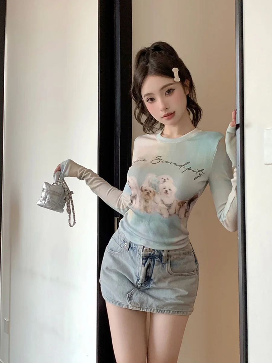 เสื้อยืดผู้หญิงทรงเข้ารูปพิมพ์ลายอเมริกัน สไตล์หวานซ่อนเปรี้ยว แขนยาว คอกลม ผ้าเนื้อนุ่ม ยืดหยุ่น ใส่สบาย เหมาะสำหรับฤดูใบไม้ร่วง