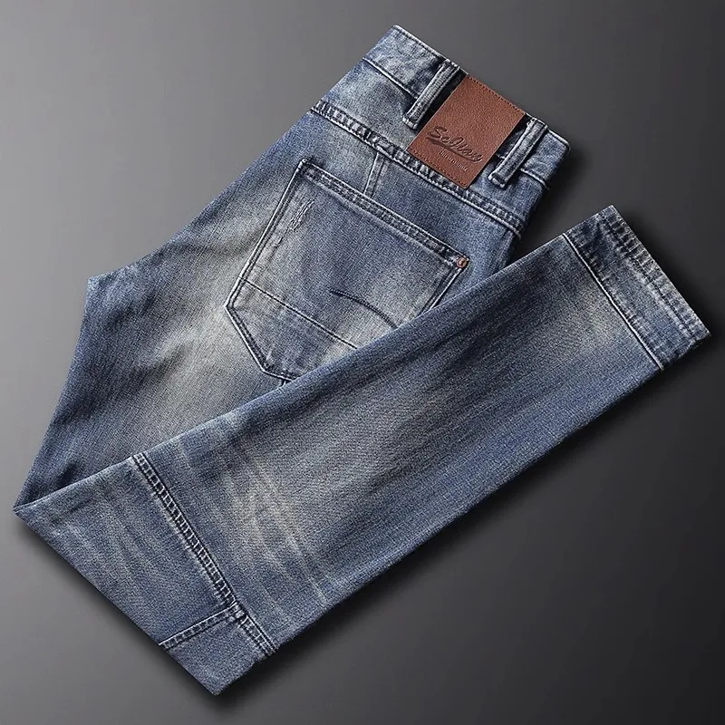 Jeans da uomo di alta moda di strada retrò lavati blu elasticizzati Slim Fit impiombati Jeans da motociclista firmati Homme pantaloni in Denim Hip Hop Patched