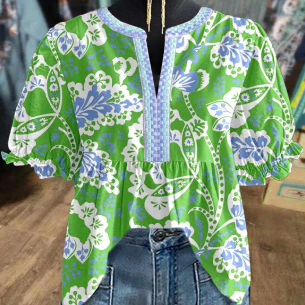 

Винтажная женская блузка с цветочным принтом, пышными рукавами и V-образным вырезом