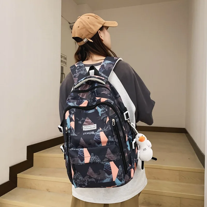 Bolsa de libros con estampado para mujer y hombre, morral escolar con grafiti para ordenador portátil, mochila de viaje para Universidad, a la moda, novedad