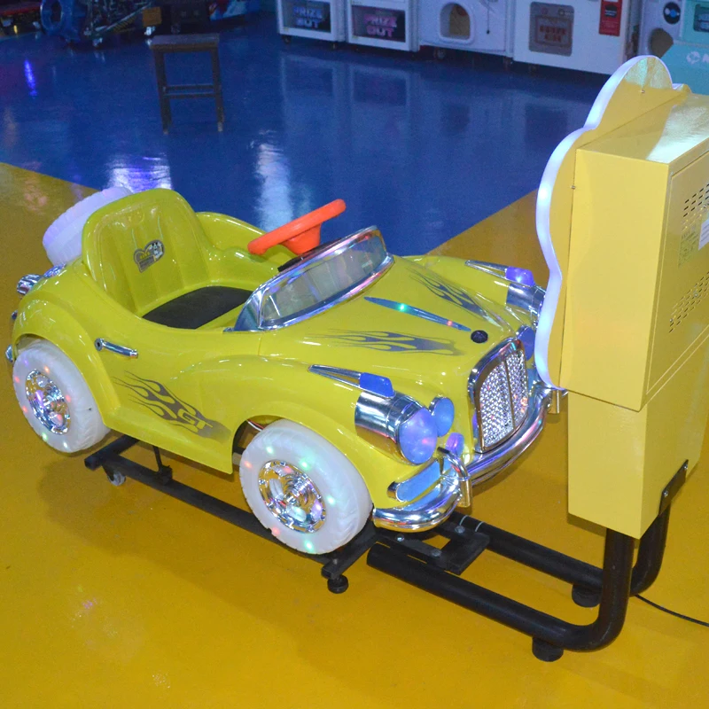 Coin-operated children ride in bubble cars
