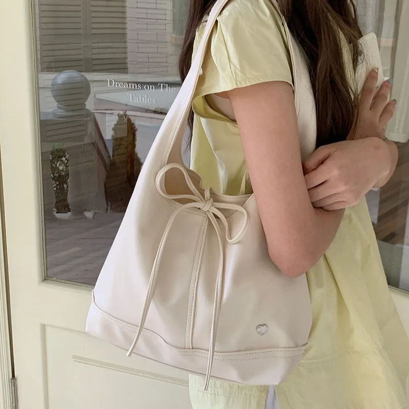 

Wear-resistant PU leather women's bag, casual bag, bow, large-capacity single-shoulder underarm tote bag