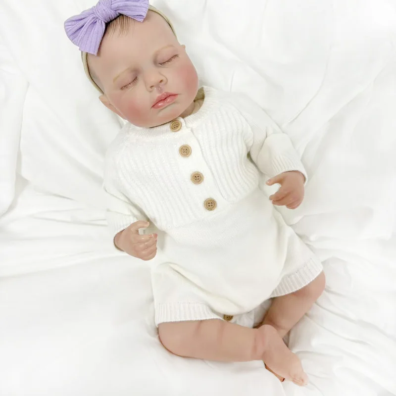 Lalka Reborn Loulou z miękkiego materiału/pełnymi winylowymi ramionami, 19 cali, realistyczna, z wielowarstwową malowaną skórą, ręcznie malowanymi włosami i widocznymi żyłkami.