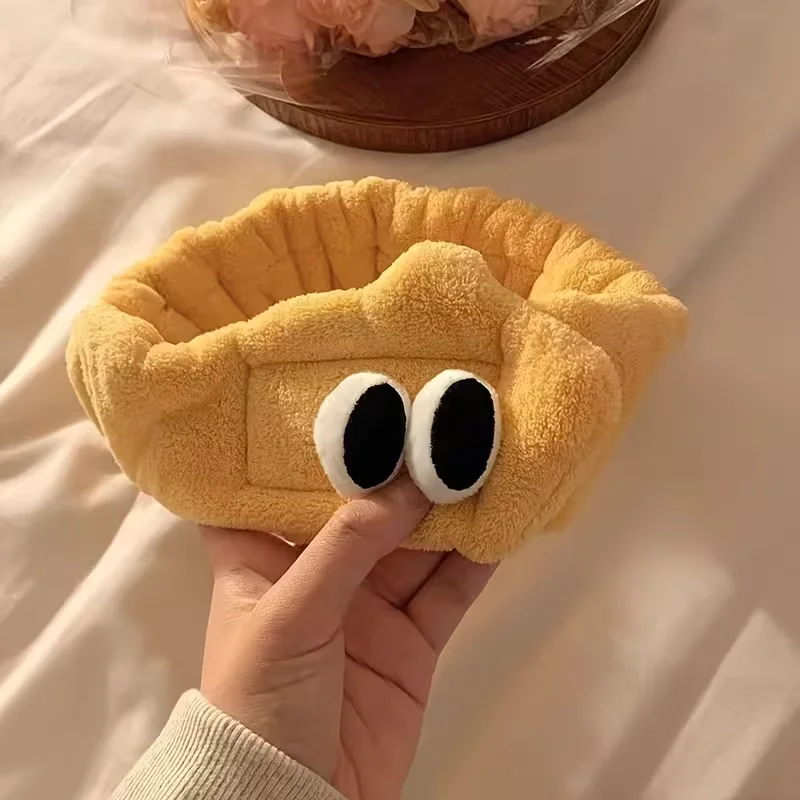 Ein süßes Cartoon-Haarband mit Augenmotiv für Damen, verstellbar, geeignet zum Gesichtwaschen und als Haaraccessoire zum Schminken. – Detail 1