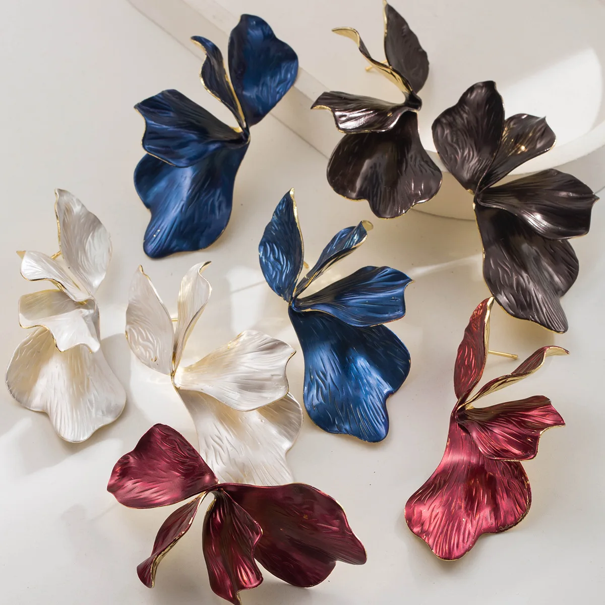 

DIGADAGU Metal Solid Color Flower Petal Stud Earrings New Simple Elegant Earrings Women Baroque Jewelry Accessories