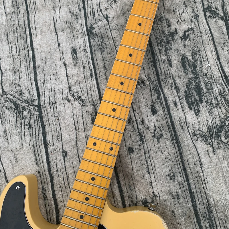 Left Hand Electric Guitar Tel light yellow Body Rosewood Fingerfrets Fixed Bridge Black Pickguard  Factory Custom