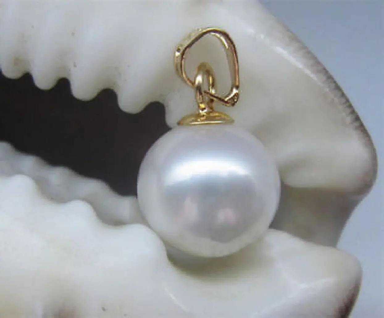 

HUGE AAA 10-11MM NATURAL SOUTH SEA WHITE PERFECT ROUND PEARL PENDANT 14k/0