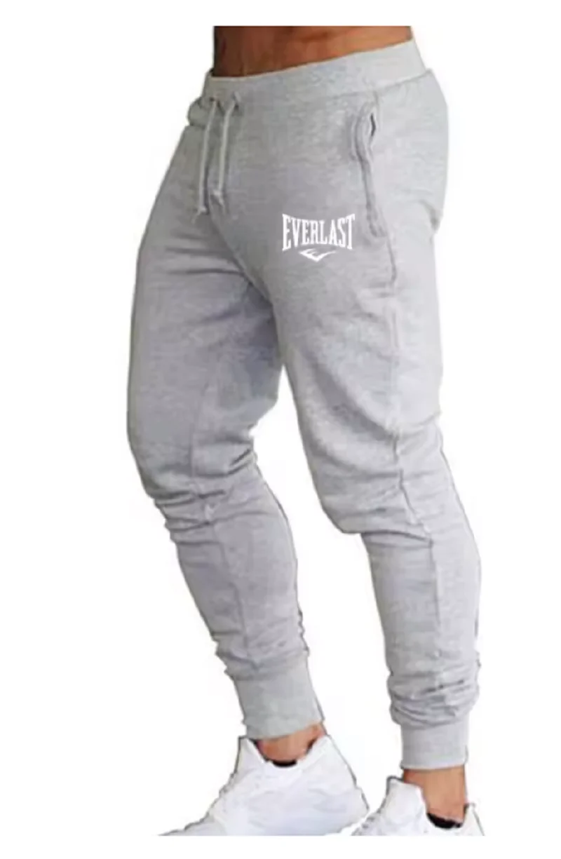 السراويل الجديدة المطبوعة الخريف EVERLAST الرجال/النساء تشغيل السراويل ركض Sweatpant الرياضة بناطيل كاجوال اللياقة البدنية الصالة الرياضية تنفس السراويل