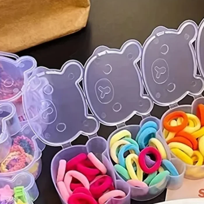 Horquilla con banda de goma, caja de almacenamiento de cuatro piezas, caja de plástico transparente con oso, pendientes, joyería, caja de embalaje de clasificación multirejilla
