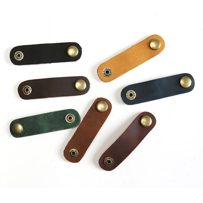 Nouveau organisateur de fil d'écouteur en cuir véritable, support d'enrouleur de câble, prise de ligne de données, enrouleur de bobine, outil de fil de câblage