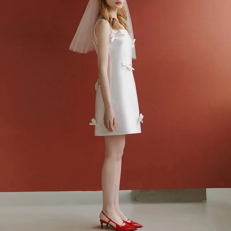 Sukienka damska 2026, nowa, satynowa, z kokardą, krótka, lekka, na wesele, wieczorowa, modna, wyszczuplająca, elegancka, na bankiet, do noszenia na co dzień, na ramiączkach.