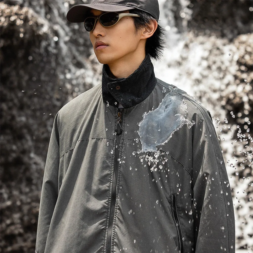 

Waterproof Mountain Techwear Jacket - Stand Collar, Loose Fit for Outdoor Adventure (Unisex)