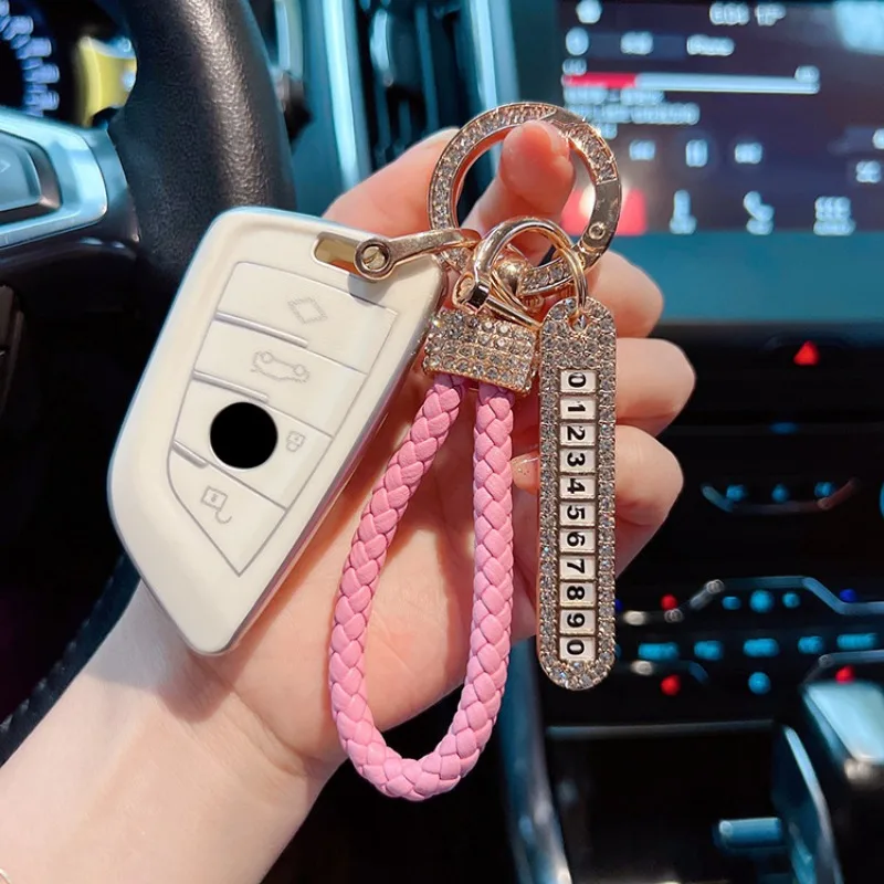 Creative and fashionable car keychain, leather handmade woven rope, full of diamonds, number plate, anti loss keychain ring