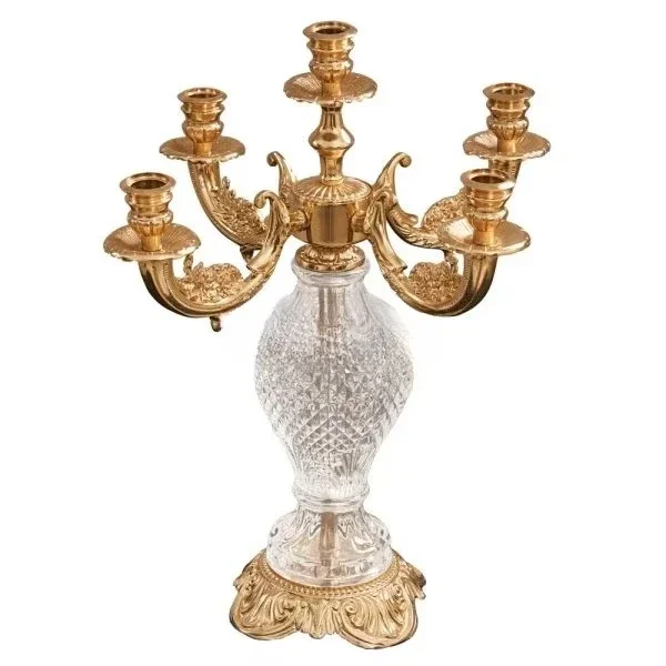Luxury antique brass candlesticks with artistic engraving details for classic home decor and elegant festive occasions