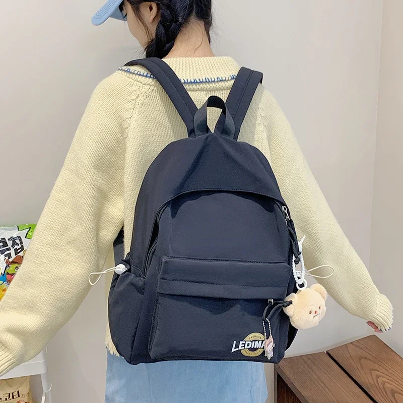 Outono e inverno nova mochila simples e versátil para mulheres, mochila de nicho de grande capacidade, computador tablet, mochila de estudante