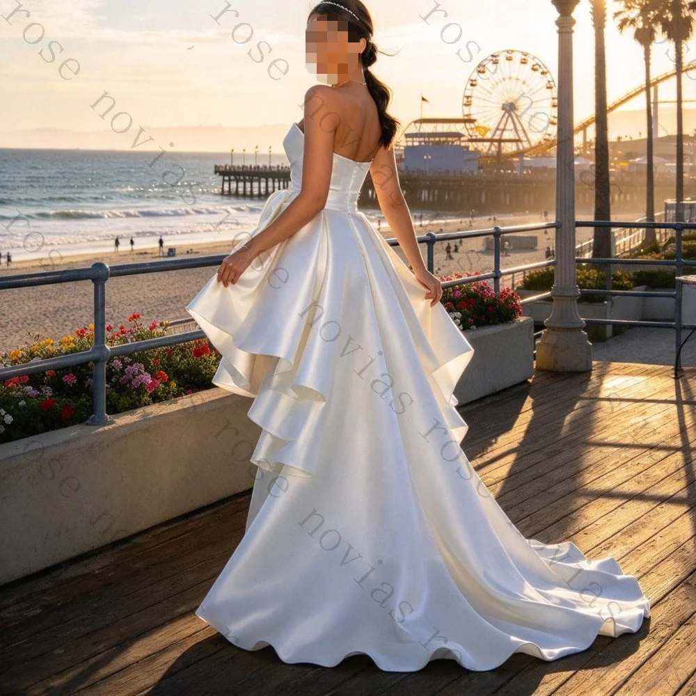 Customized Simple Strapless Satin Irregular Skirt Wedding Dresses 2026 Short Princess Pleated Bridal Gown Suitable for Beach