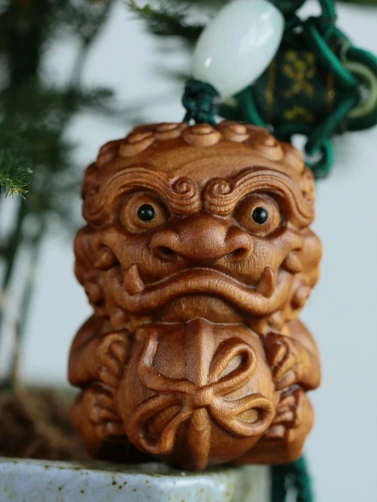 

Fragrant Wood Lion Holding Ball Solid Wood Animal Carving Craft Car Key Pendant