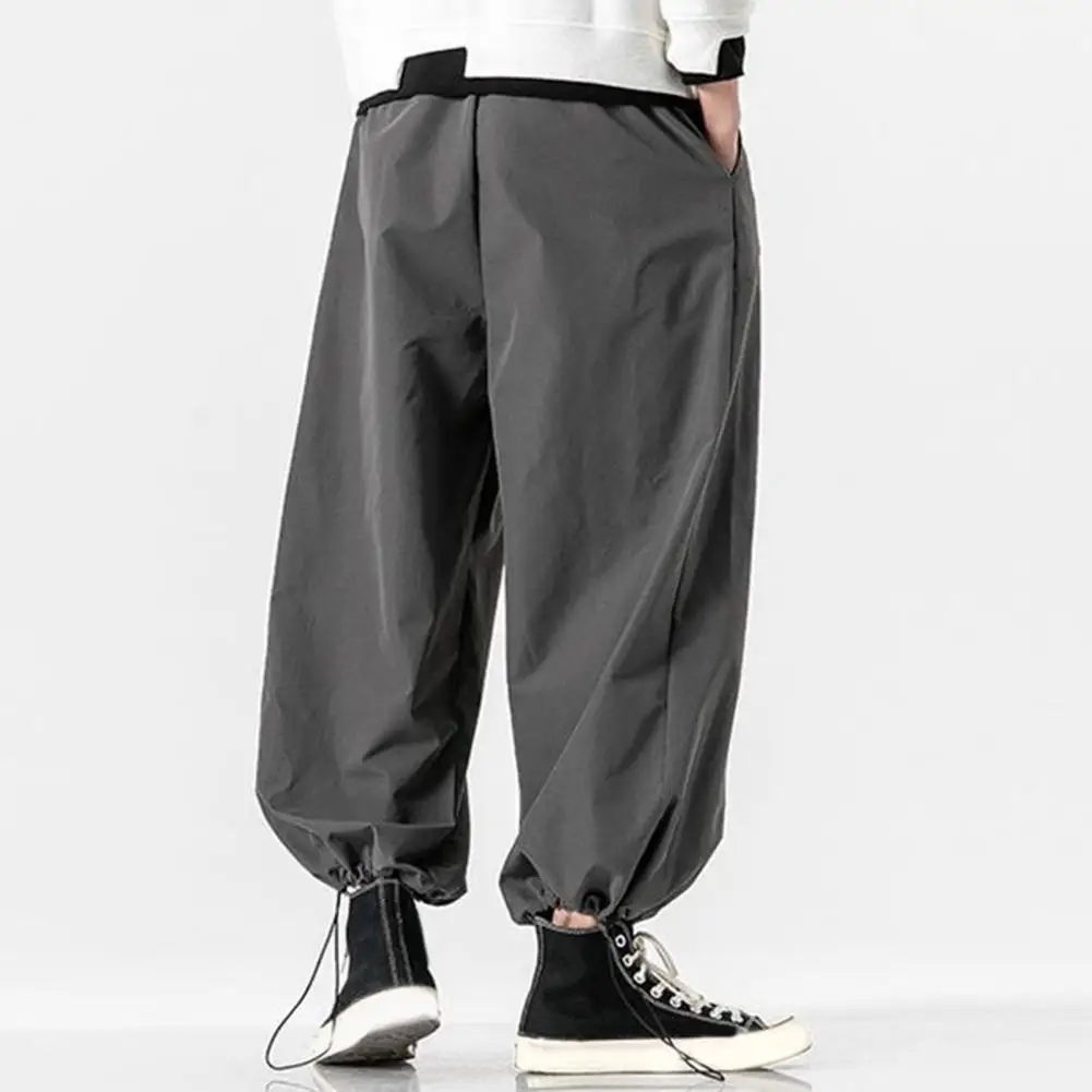 

Men Bloomers Japanses Style Loose Deep Crotch Casual Pants Solid Color Drawstring Elastic Waist Ankle-banded Harem Pants