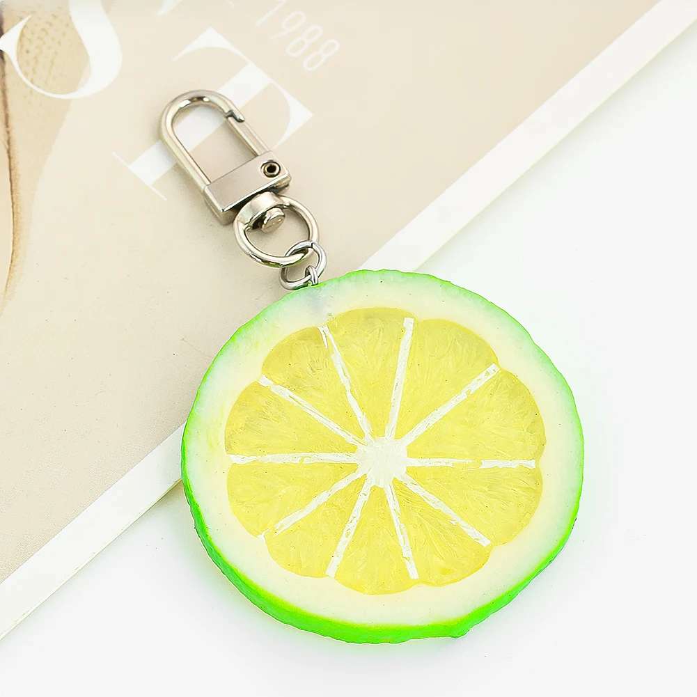 

PVC Lemon Slice Keychain Creative Simulation Fruit Metal Pendant Shooting Props Fun Book Bag Car Key Charm Children's Gifts