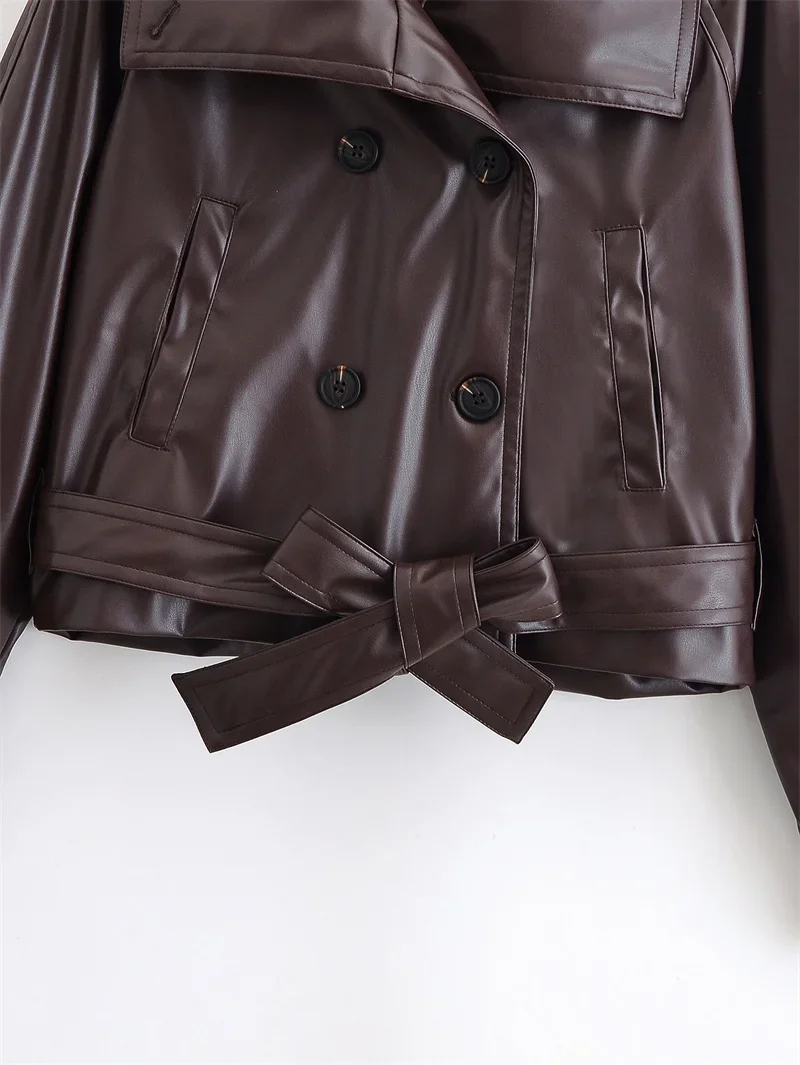 Cappotto da donna autunno nuovo stile marrone scuro manica lunga doppiopetto bavero cintura decorativa corta in ecopelle