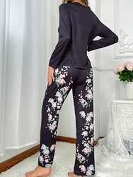 Floral print pajama set with long sleeve crew neck top and elasticated belt pants