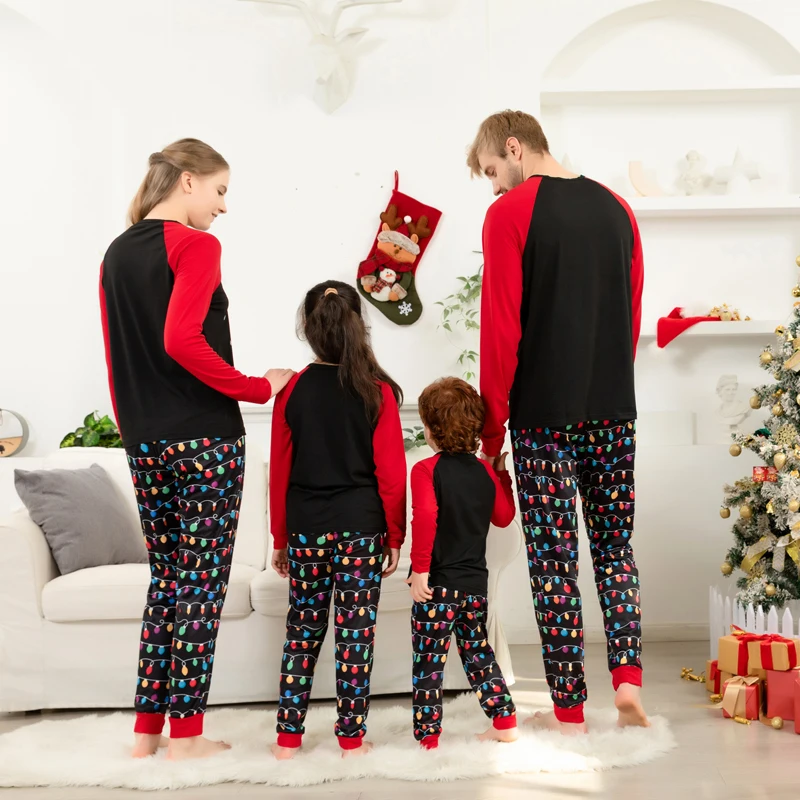 Festive Matching Family Christmas Pajamas Cozy Long Sleeve Reindeer Print Tops Twinkling String Lights Pants Ensemble