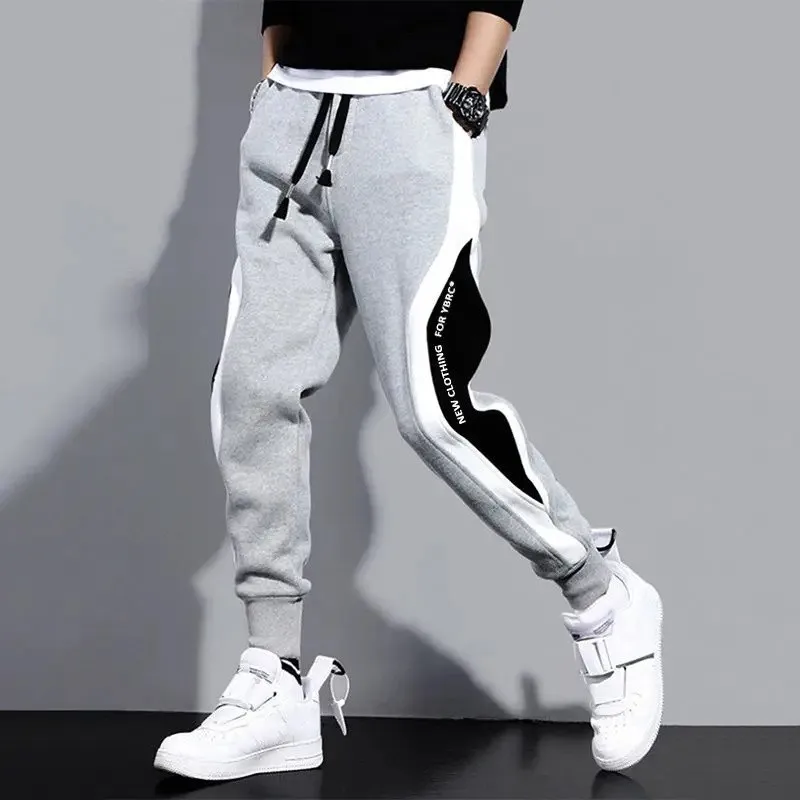 Pantaloni larghi larghi Casual da uomo pantaloni Patchwork alla moda autunno inverno più caldi in pile pantaloni lunghi addensati pantaloni sportivi pantaloni da jogging