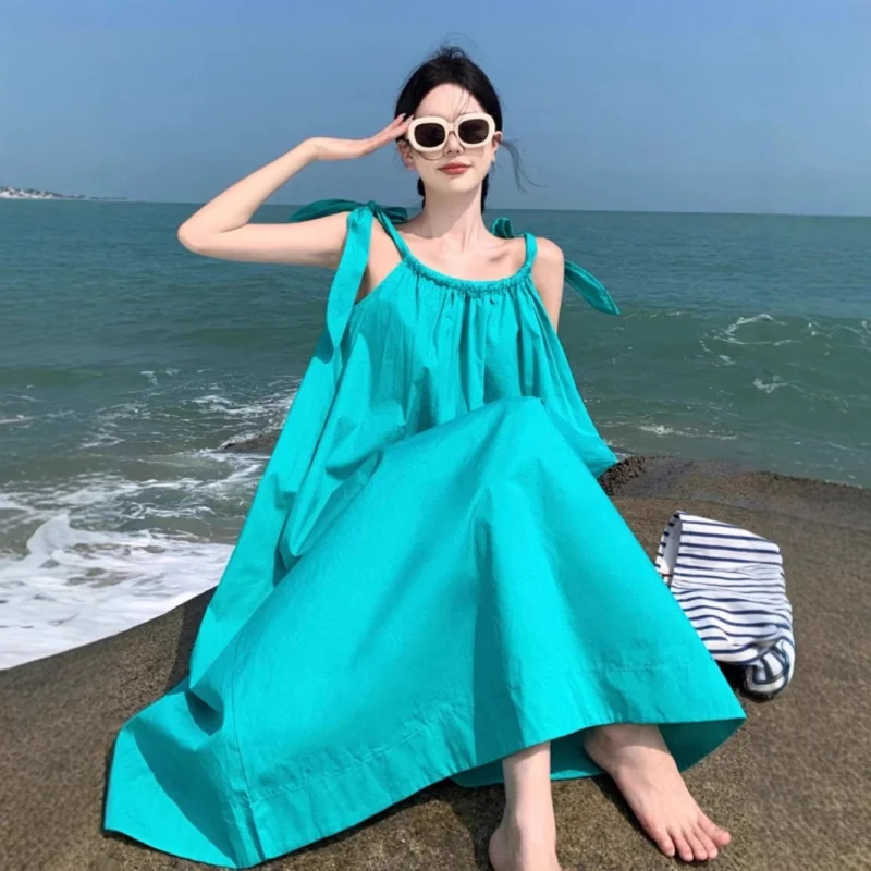 

Французский стиль, весна-лето, элегантное однотонное отпускное платье с открытой спиной и бретельками, женское пляжное платье с лямкой на шее, длинное платье