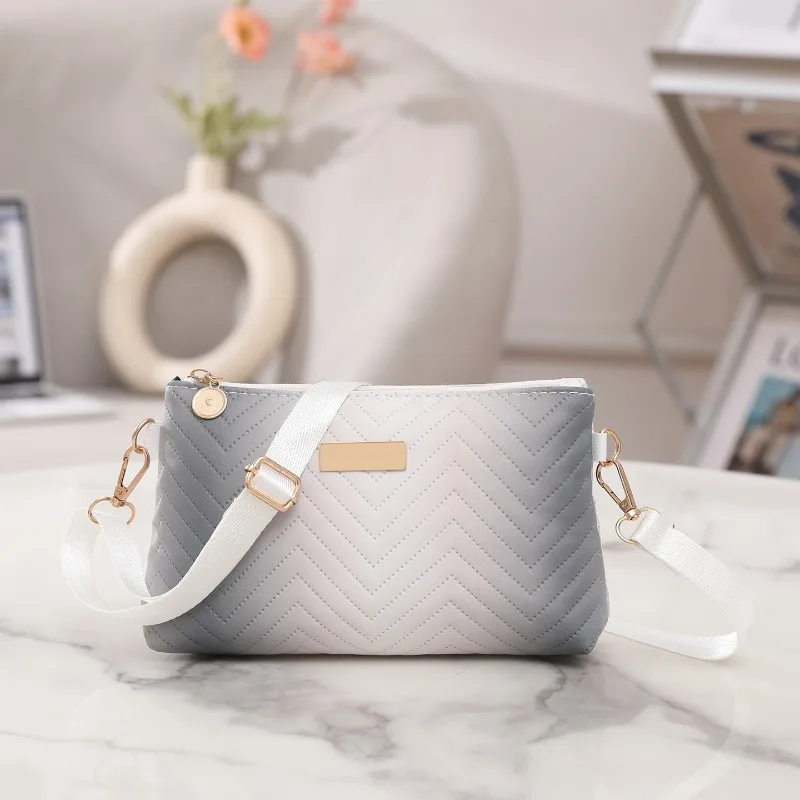 Nieuwe stijlvolle eenvoudige veelzijdige kleine vierkante tas effen kleur schoudertas modieuze prachtige kleine onderarmtas reizen