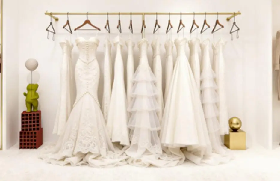 

Gold Wall Mounted Hangers for Women's Clothing Store Display Shelves Dedicated Retail Apparel Organizer