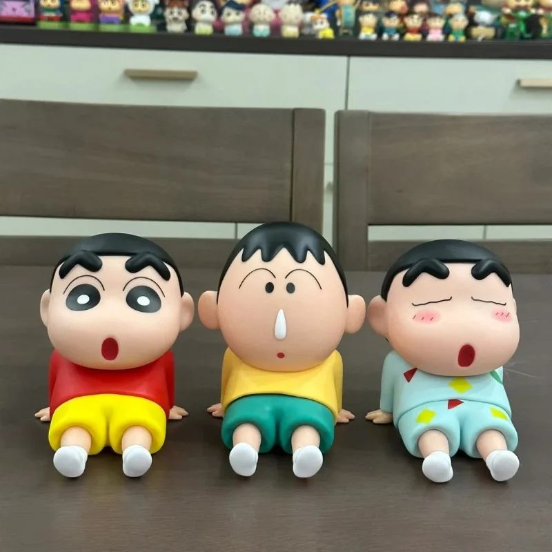 Nowa kredka Shin-chan figurka leniwy uchwyt na telefon komórkowy Nohara Shinnosuke Anime figurka kolekcja pcv zabawki modele prezenty dla dzieci