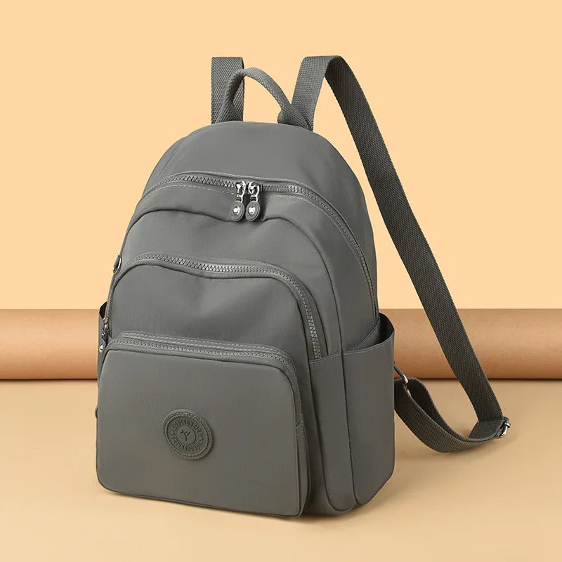casual-a-multi-layer-waterproof-and-stylish-backpack-oxford-large-capacity-simple-commuter-out-of-town-student-backpacks-mochila