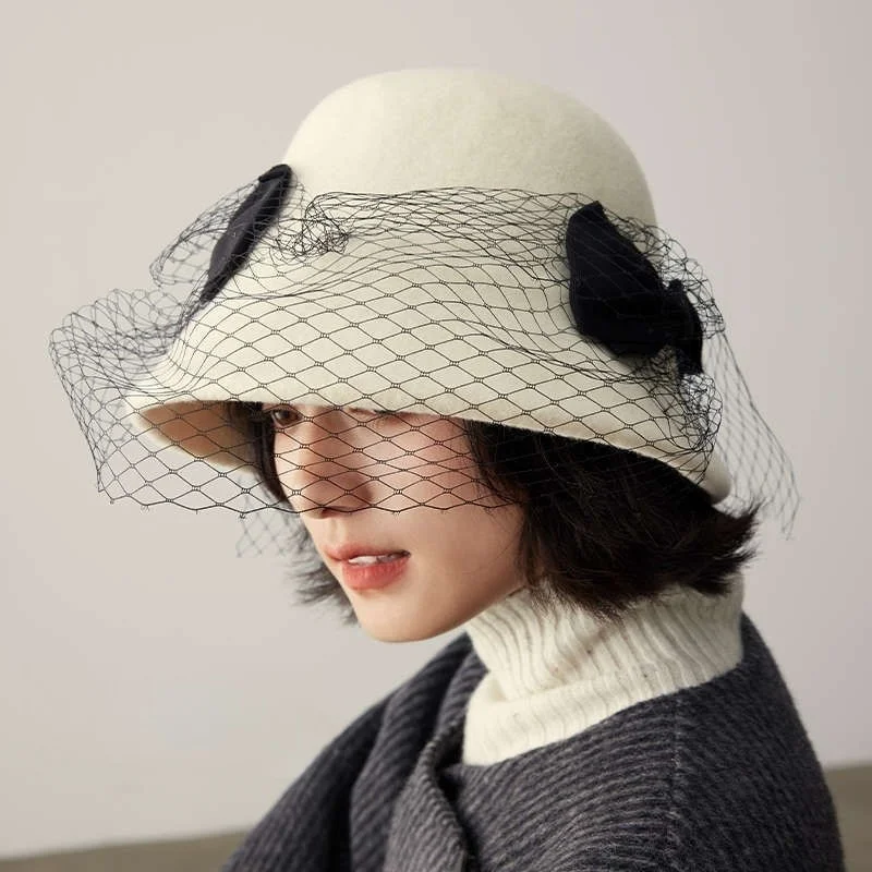 A vintage top hat and lace made of blended mesh gauze